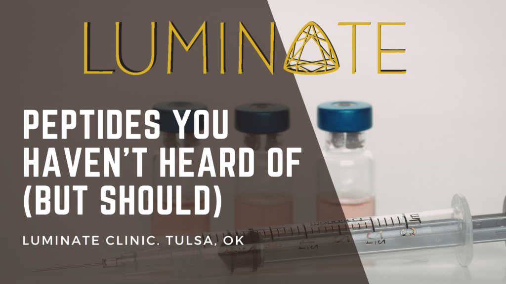 Vials of peptides and syringe on a table